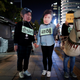 Protesters wearing cut-outs of Park Geun-hye, center, and Choi Soon-sil attended a protest in Seoul in October 2016.